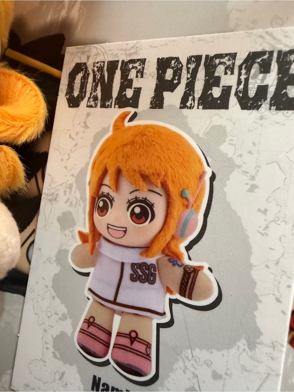 One Piece Nami plush pendant from the TOP TOY x EAKI Egghead Arc Series - Picture 2 of 5